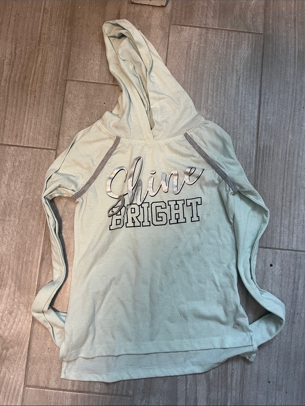 Marika Light Blue Long Sleeve Hooded Tee with "Shine Bright" Graphic